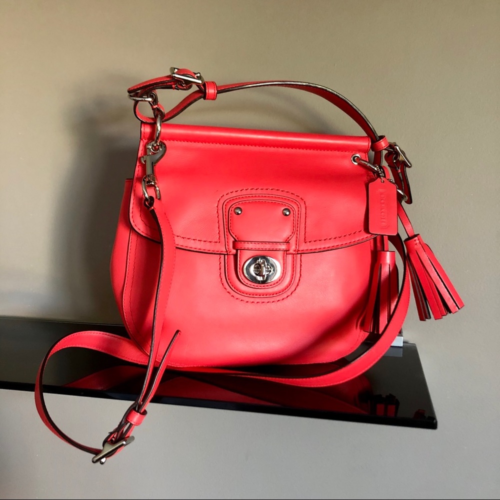 Coral coach handbag with crossbody strap